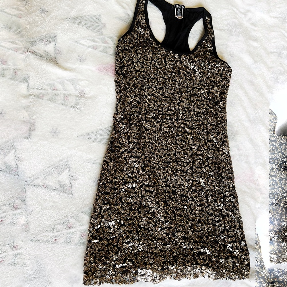 Black dress with gold sequins
